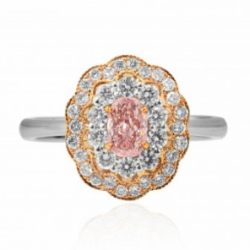 Fancy Intense Pink Oval Diamond Halo Ring mounted in Platinum and 18K rose gold